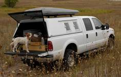 Pickup truck with camper cap